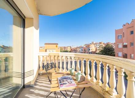 Modern apartment with communal swimming pool and parking space.0