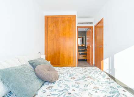 Modern apartment with communal swimming pool and parking space.32