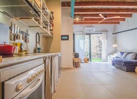 Busques un pis en planta baixa a Sant Pere Pescador on combinar comoditat, llum i qualitat de vida?3