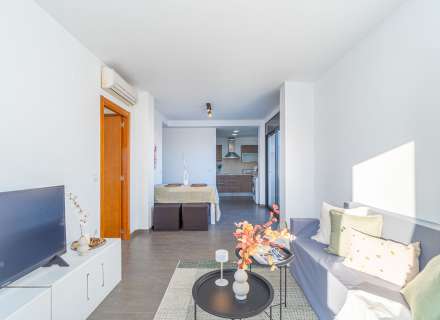 Modern apartment with communal swimming pool and parking space.25