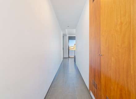 Modern apartment with communal swimming pool and parking space.16
