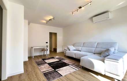 Pis ampli i lluminós al cor de la ciutat.