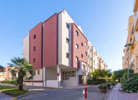 Modern apartment with communal swimming pool and parking space.4