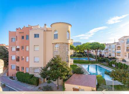 Modern apartment with communal swimming pool and parking space.30