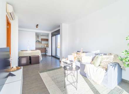 Modern apartment with communal swimming pool and parking space.24