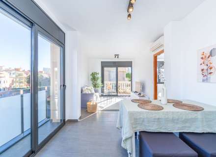 Modern apartment with communal swimming pool and parking space.19