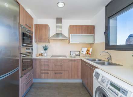 Modern apartment with communal swimming pool and parking space.20