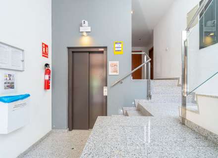 Modern apartment with communal swimming pool and parking space.7
