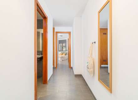 Modern apartment with communal swimming pool and parking space.9